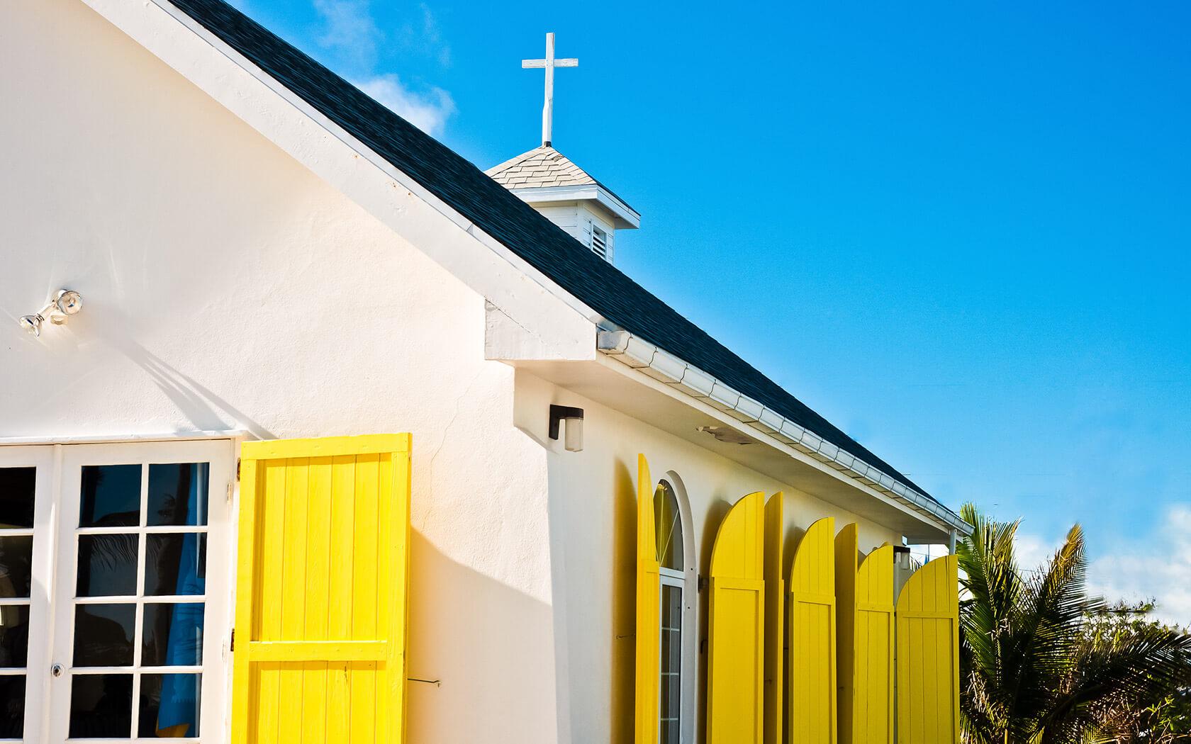 church with yellow shutters