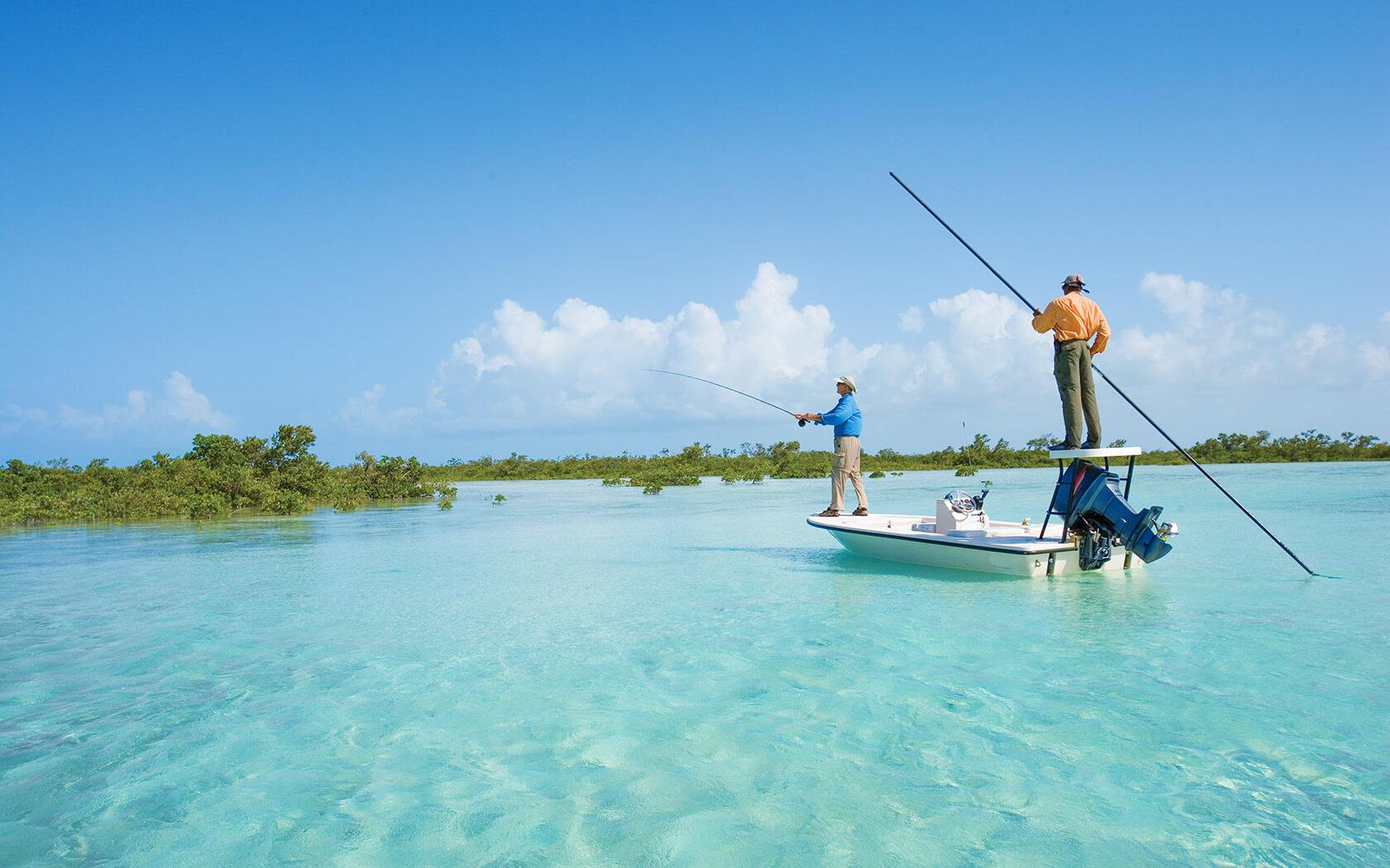 two men in a boat fishing