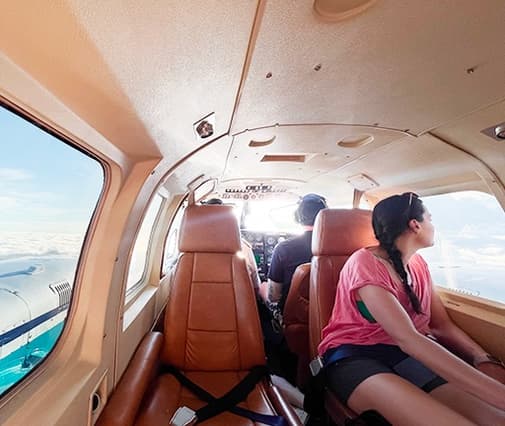 people boarding small airplane